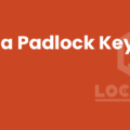 Padlock with three spare keys laid out on a table